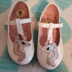 Size 9 Unicorn shoes.